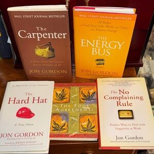 Collection of Inspirational Books by Jon Gordon and Don Miguel Ruiz